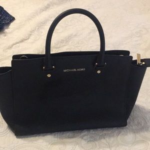 Michael Kors black Selma tote handbag.